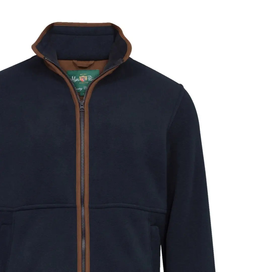 Navy blue Alan Paine Aylsham fleece jacket with brown trim at collar and zipper