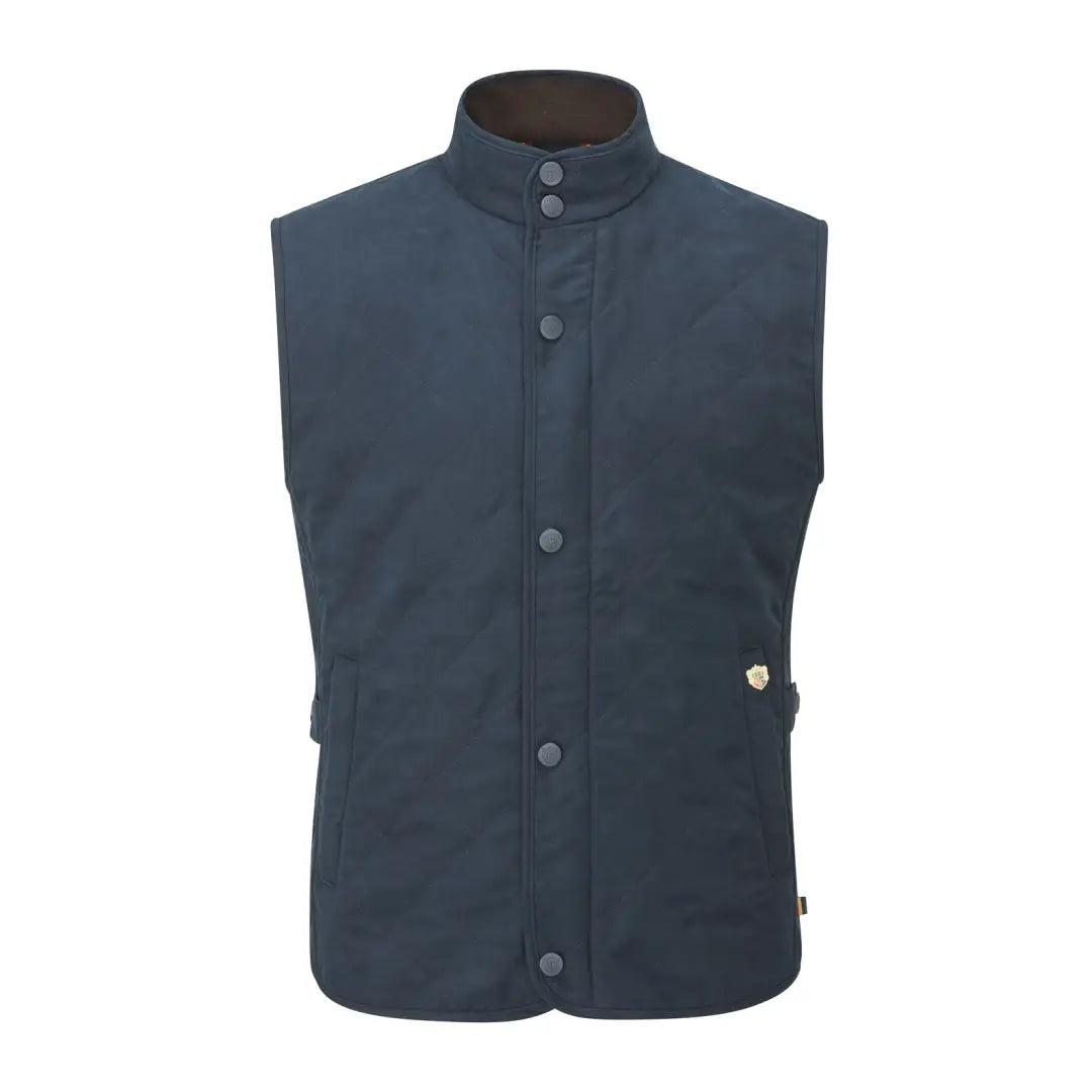 Navy blue sleeveless vest with snap buttons and stand-up collar from Alan Paine Felwell