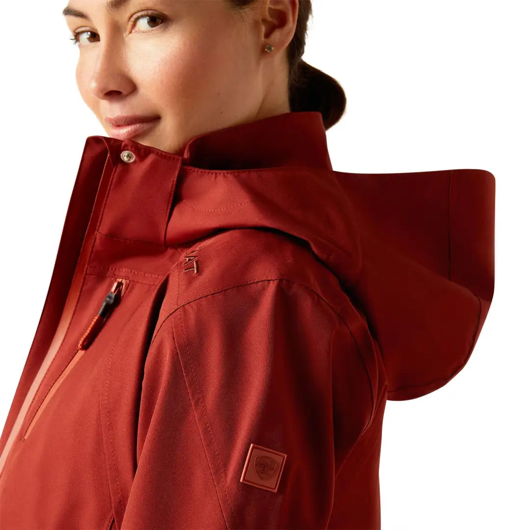 Red hooded jacket with zipper details, perfect for country clothing and outdoor adventures