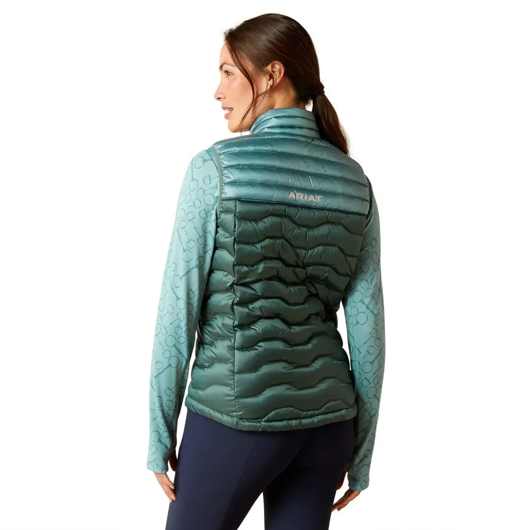 Teal quilted puffer vest perfect for country clothing and outdoor adventures