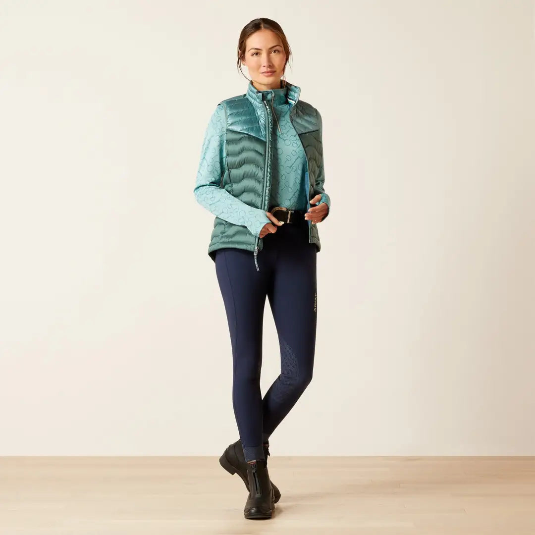 Teal quilted vest over matching top, perfect for country clothing and outdoor adventures