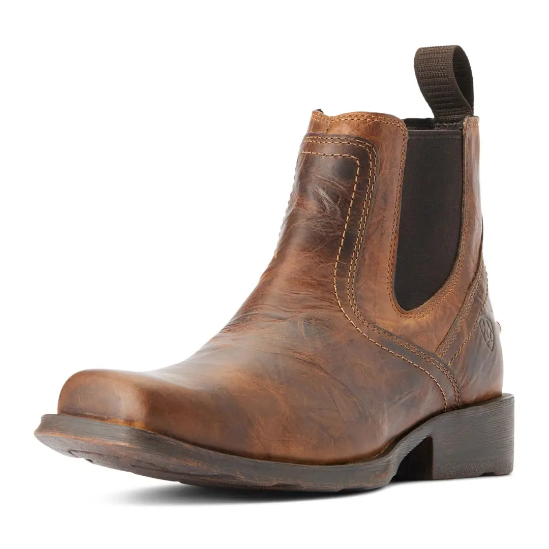 Brown leather Chelsea boots with square toe, perfect for country clothing and outdoors