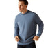 Light blue Ariat Tedstock Sweatshirt over a collared shirt, perfect for country clothing and outdoors