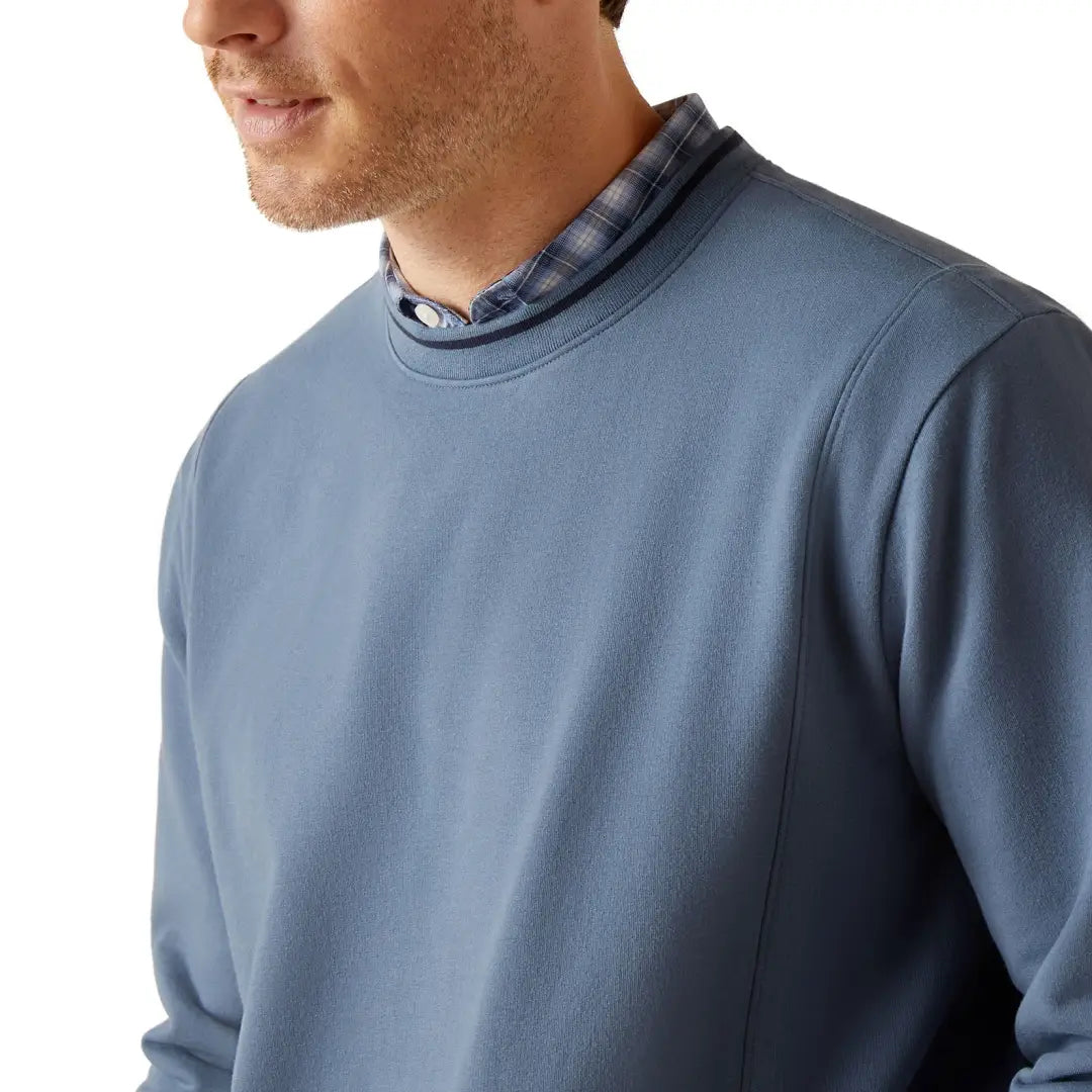 Blue crewneck sweatshirt over collared shirt, perfect for country clothing and outdoor adventures