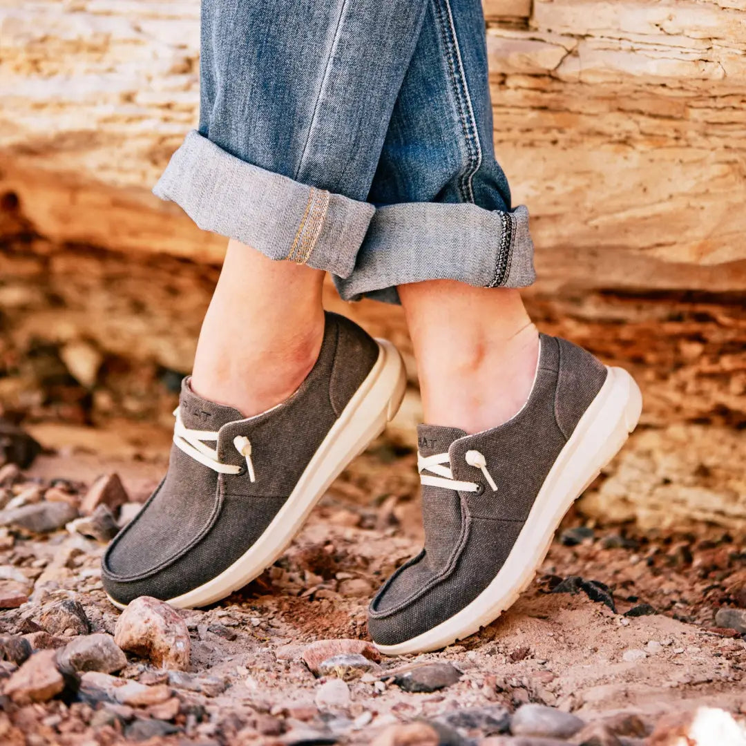 Gray canvas slip-on sneakers with white soles for stylish country clothing and outdoors fun