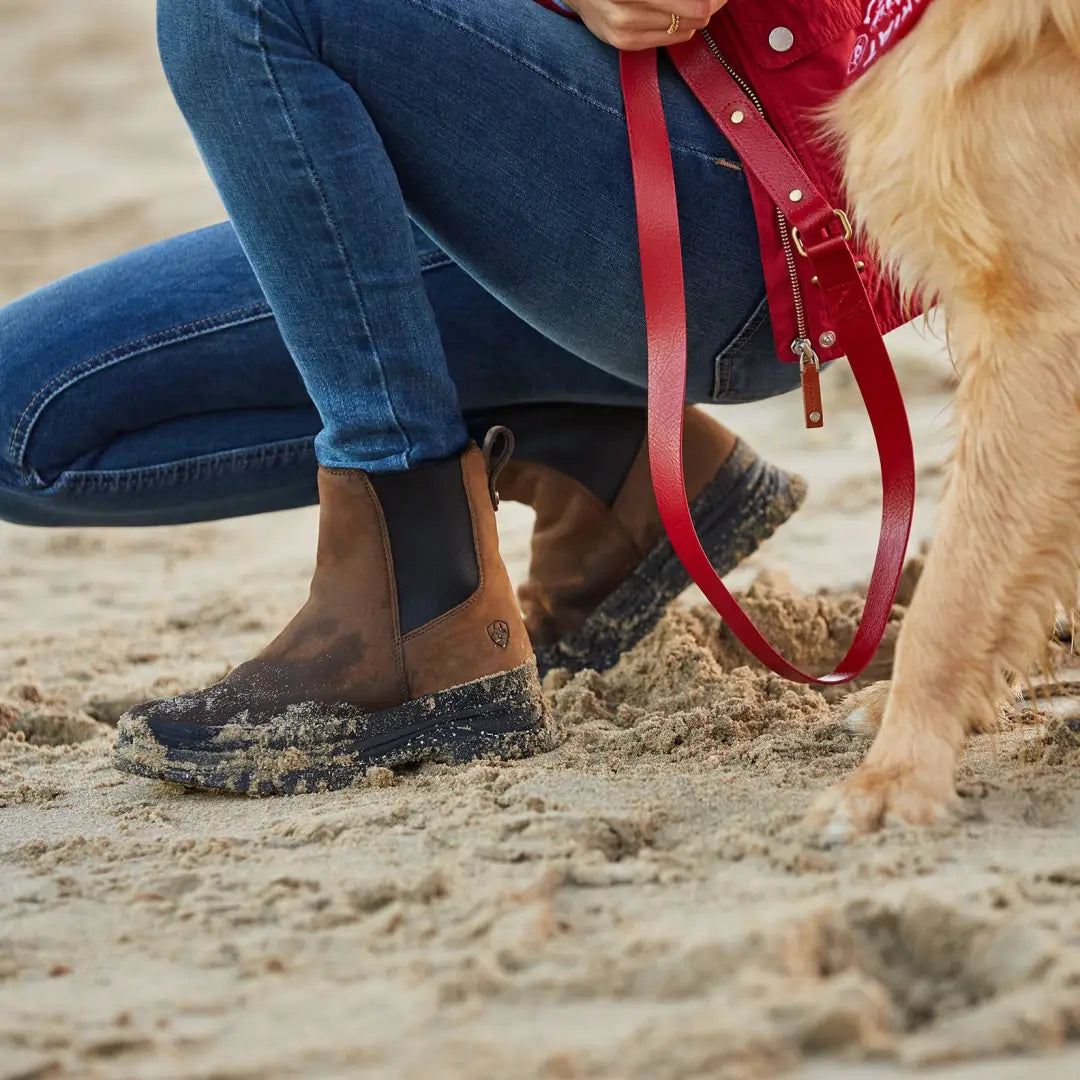 Brown leather ankle boots ideal for country clothing adventures with a dog outdoors