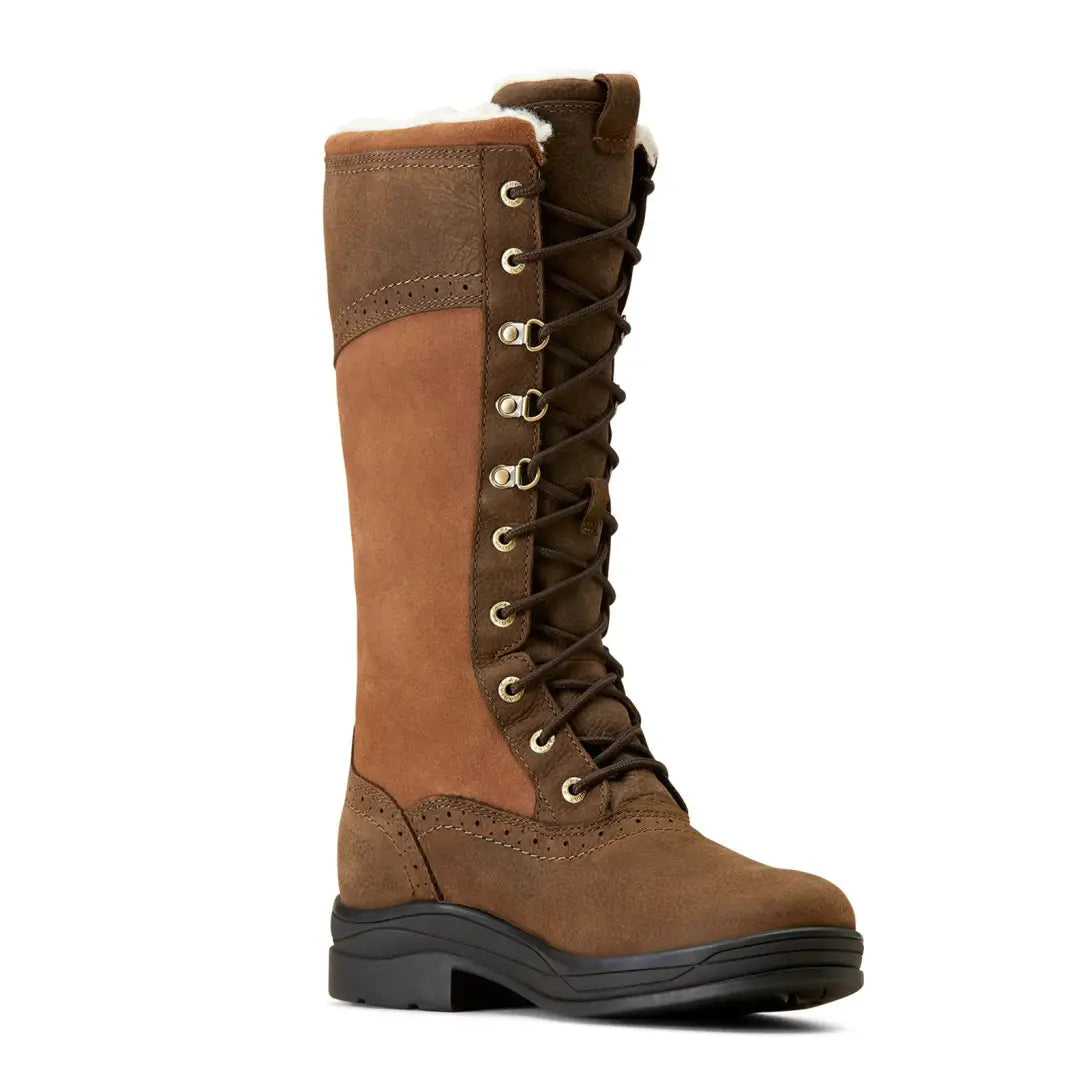 Tall brown leather lace-up boot with thick sole for hunting and outdoor adventures