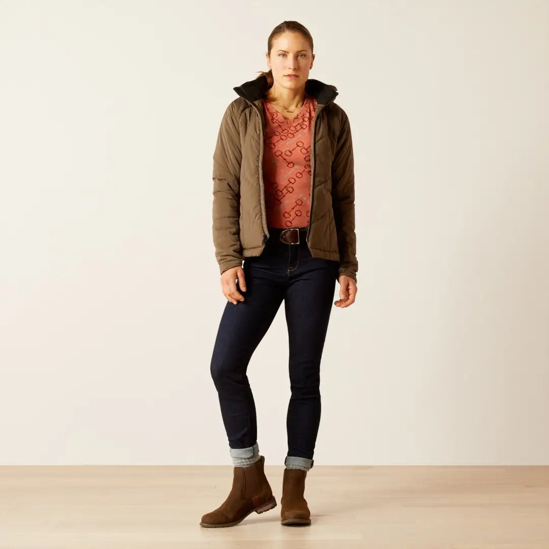 Woman in brown jacket and red top showcasing Ariat Zonal Insulated Jacket style