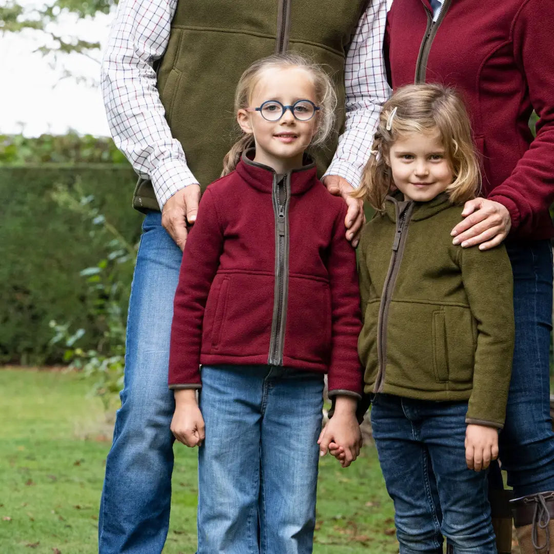 Two young girls in Baleno Cody Childrens Fleece Jackets enjoying the outdoors together