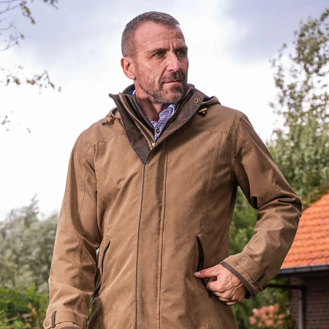 Middle-aged man in tan Baleno Livingstone Drovers Coat, perfect for hugely popular outback adventures