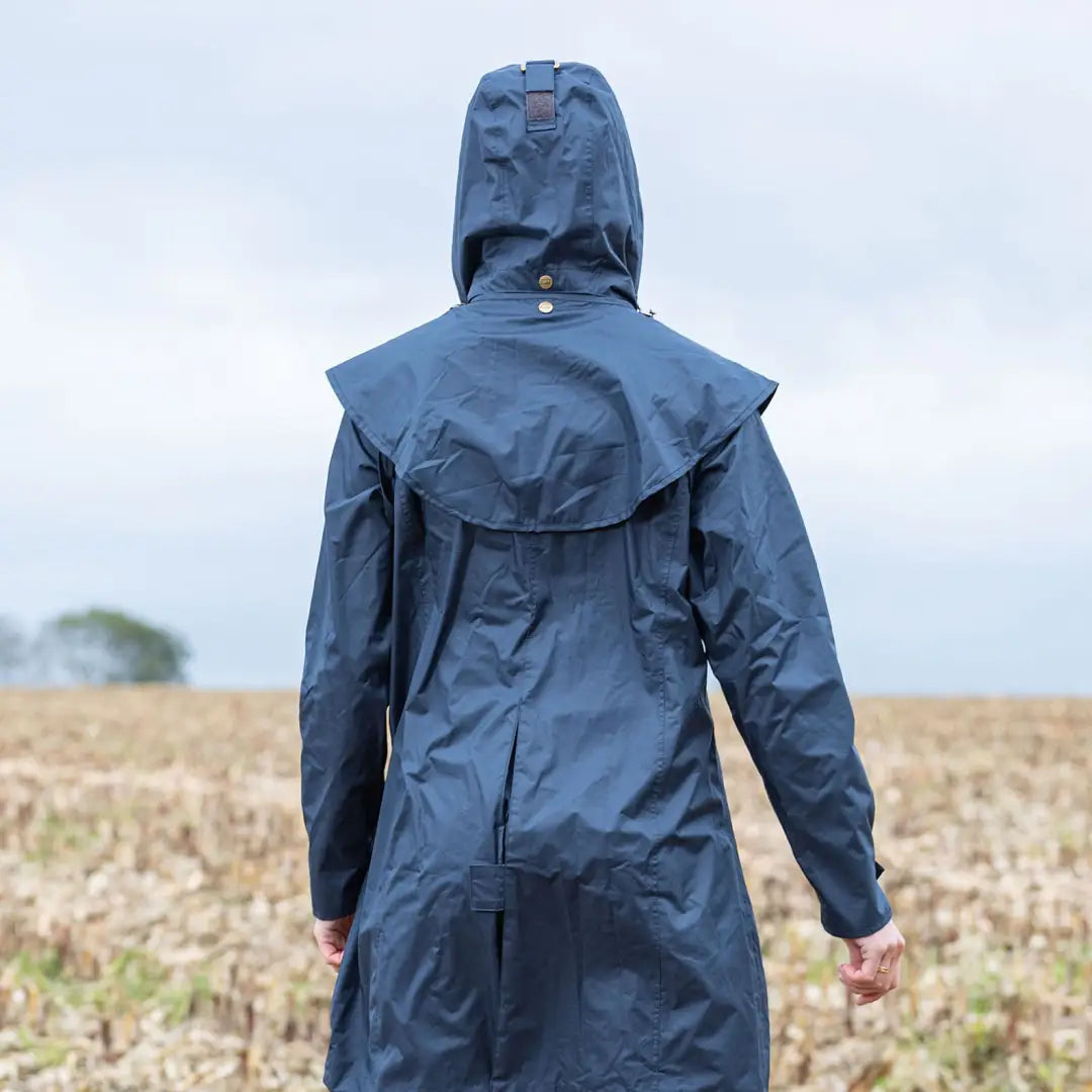 Blue Baleno Worcester women’s jacket worn in a field for stylish rainy days