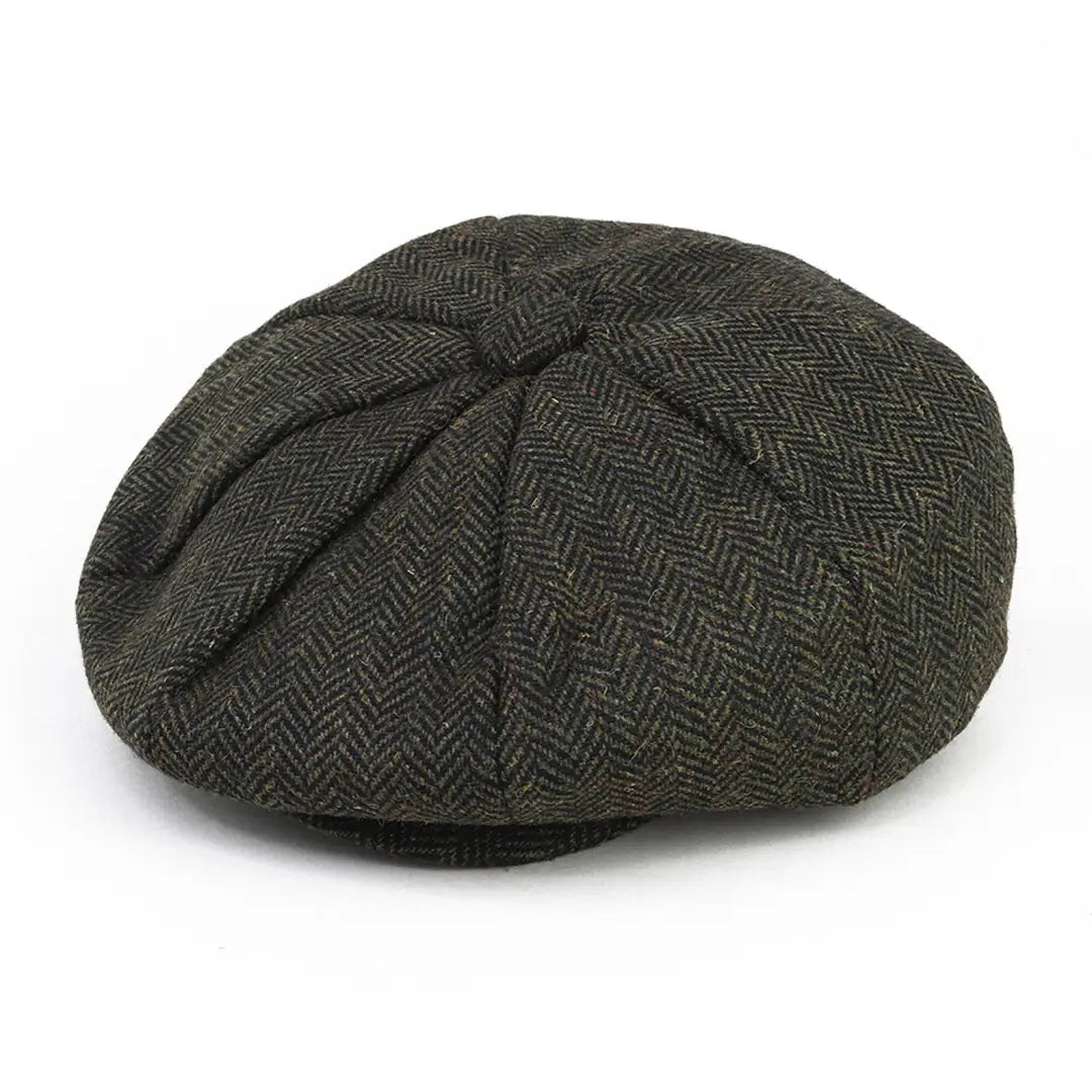 Dark green herringbone tweed newsboy cap featuring interior quilting for stylish looks