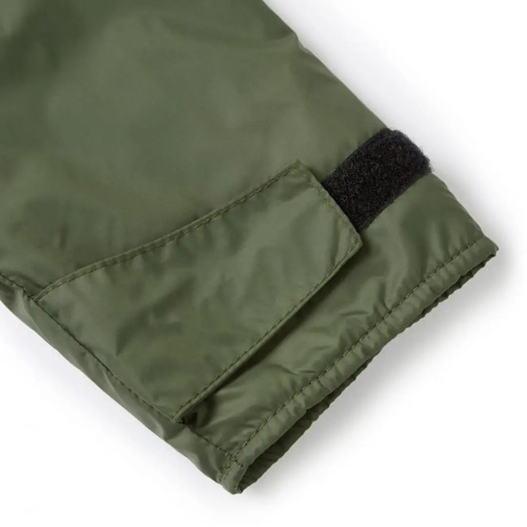 Sleeve cuff of an Olive Green Buffalo Mountain Shirt with a Black Velcro fastener