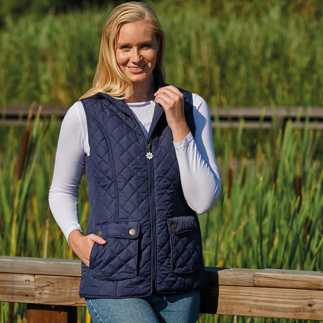 Navy blue quilted vest over a white shirt from Champion Banbury Ladies collection