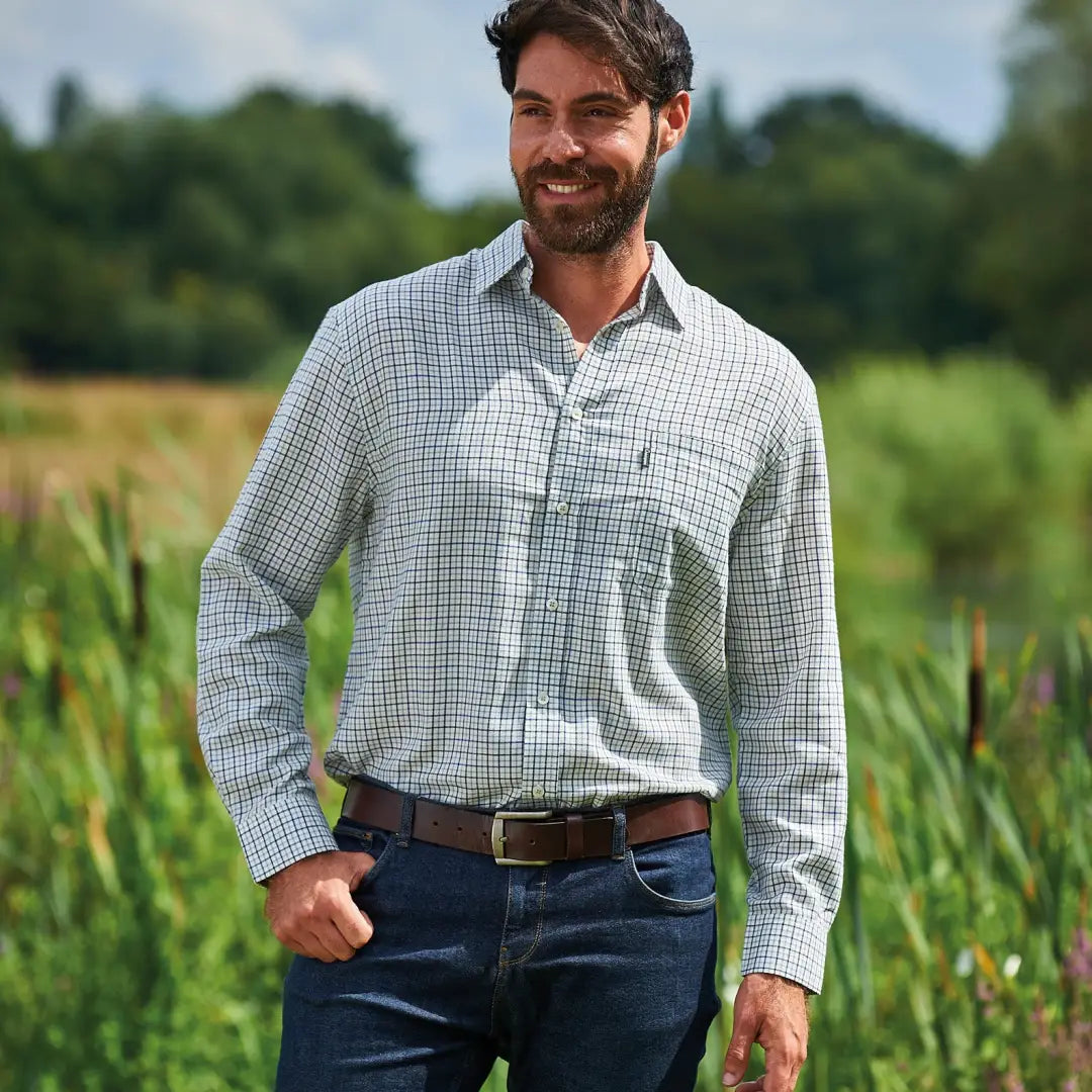 Smiling bearded man rocking a Champion Epsom Long Sleeve Shirt with jeans