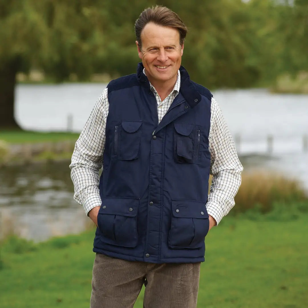 Navy blue Champion Exmoor Bodywarmer over a checkered shirt with handy pockets