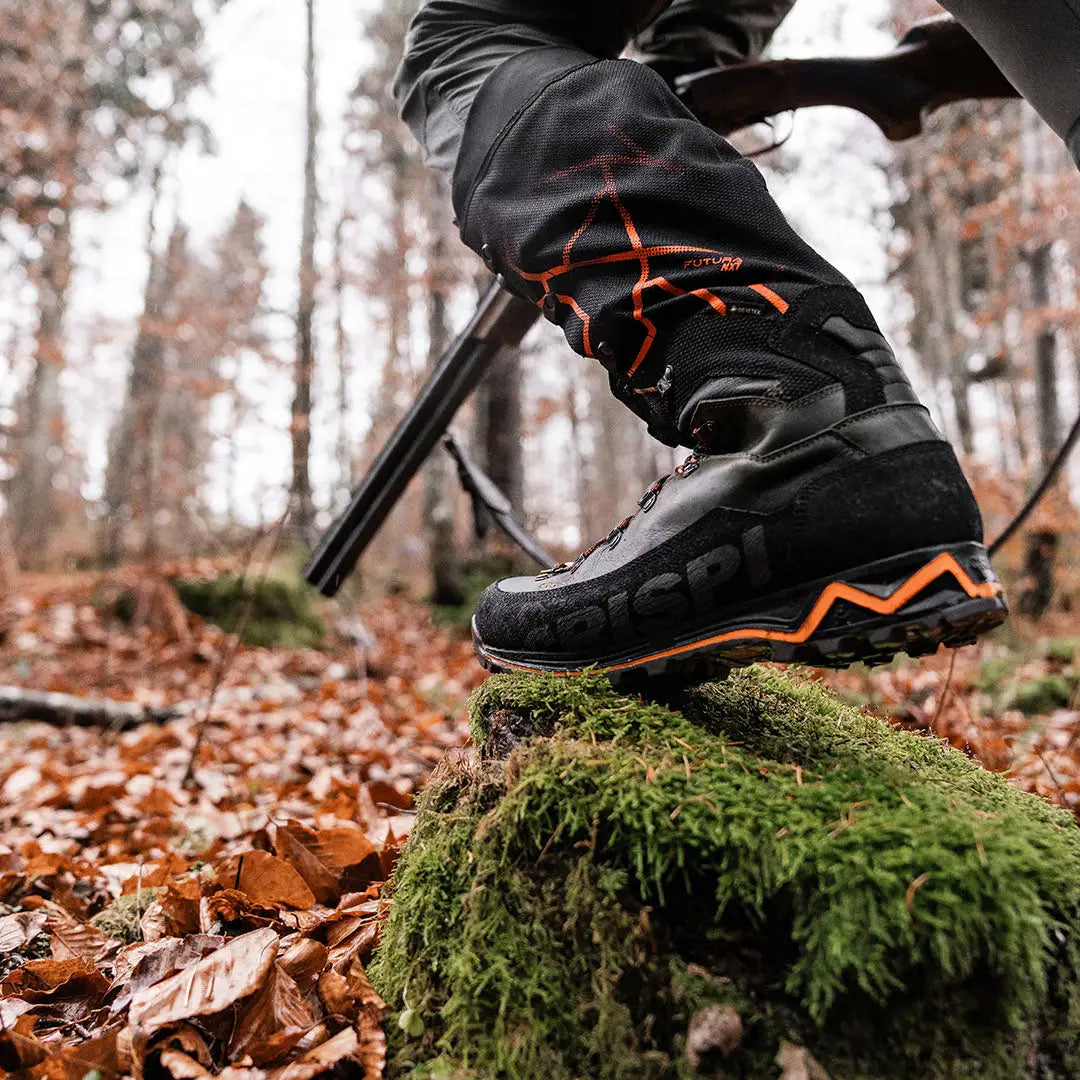 Crispi Futura NXT GTX hiking boot with orange accents on mossy ground