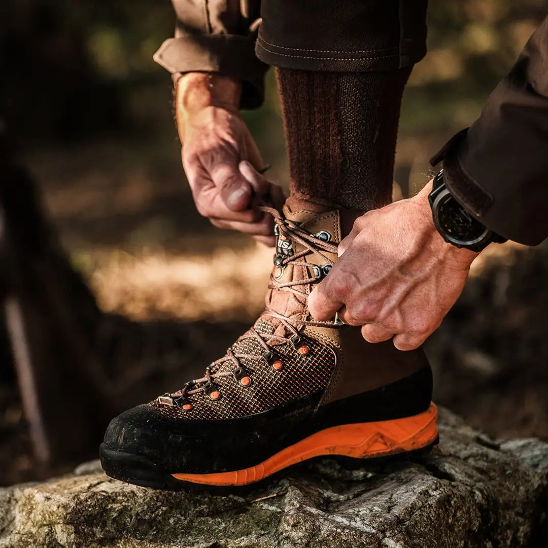 Rugged Crispi Track GTX Boots with orange soles, perfect for outdoors and hunting adventures