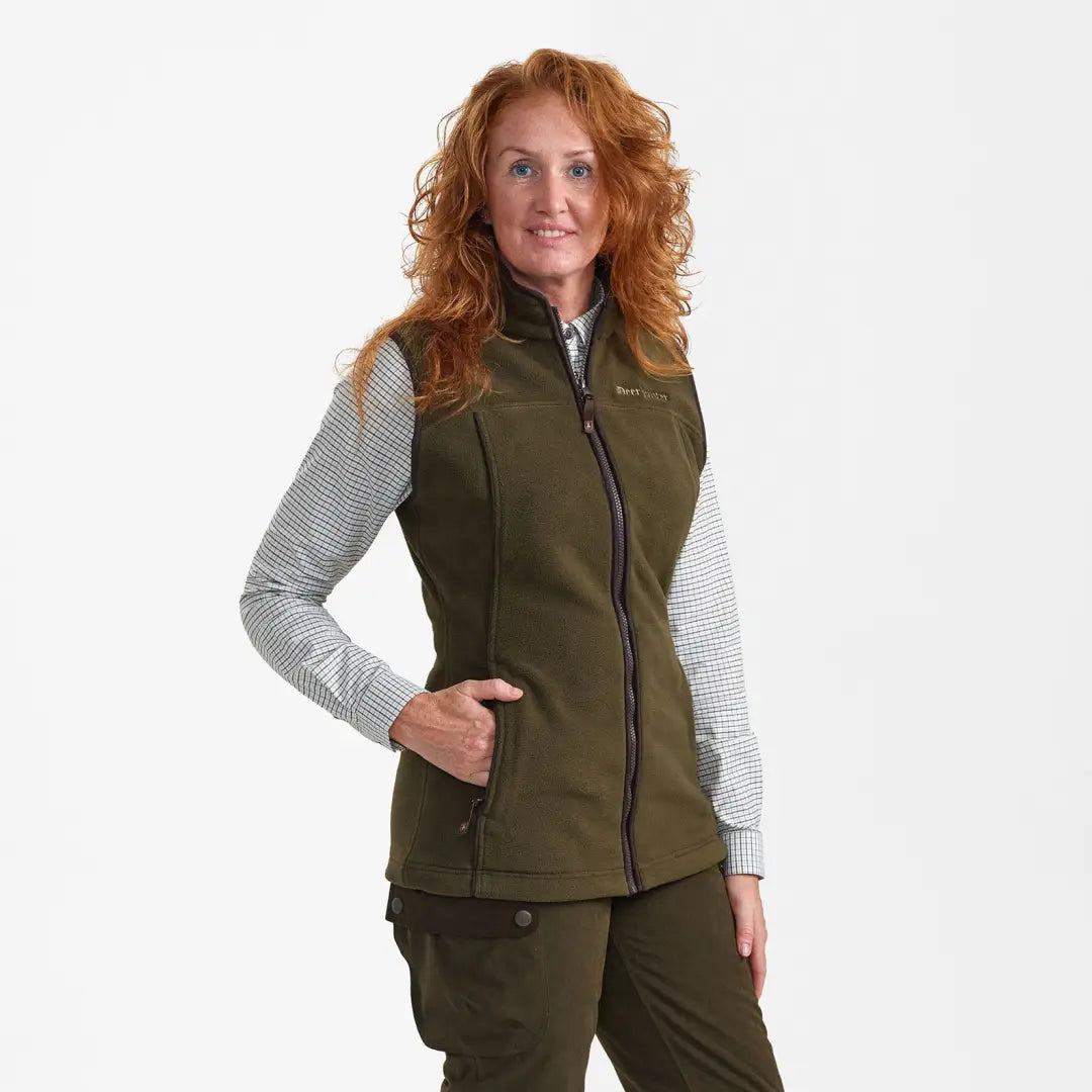 Green sleeveless Deerhunter Lady Eagle Fleece Waistcoat over a light long-sleeve shirt