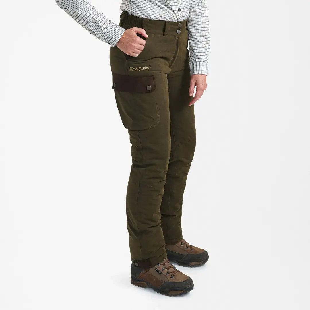 Dark green cargo pants with pockets, paired with brown boots, perfect for Lady Eagle Winter