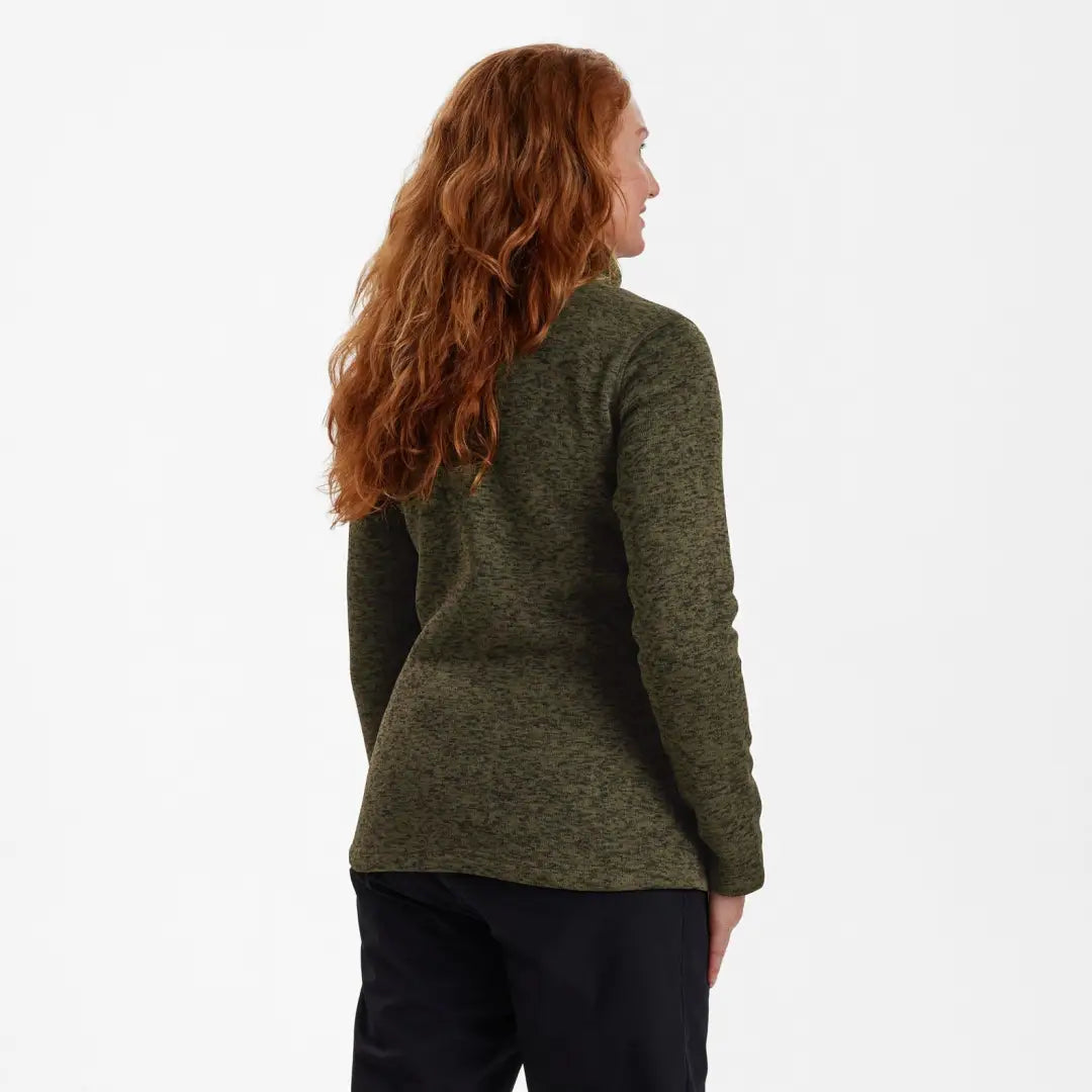 Woman with long red hair in a Green Deerhunter Lady Sarek Knitted Jacket from behind