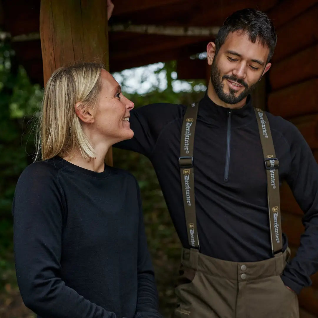 Happy couple outdoors wearing Deerhunter Quinn Merino ½-Zip Undershirt, enjoying life