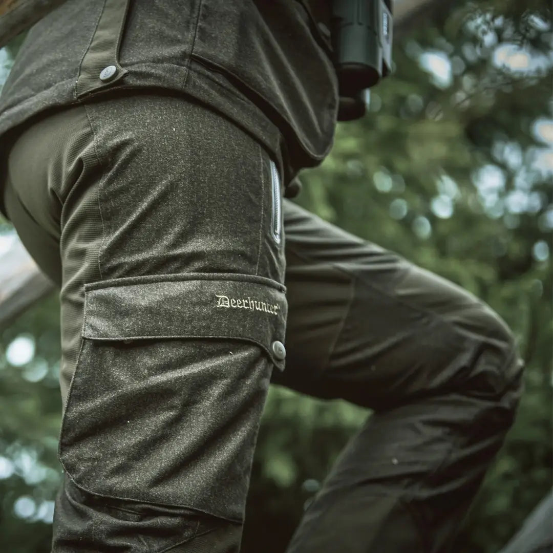 Olive green Deerhunter Ram Trousers with pockets and Blackstone logo on the thigh