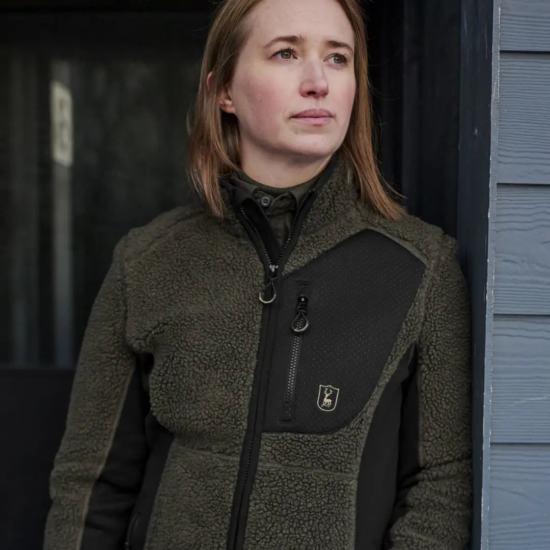 Woman in a green and black Deerhunter Roja Ladies Fiber Pile Jacket looking stylish