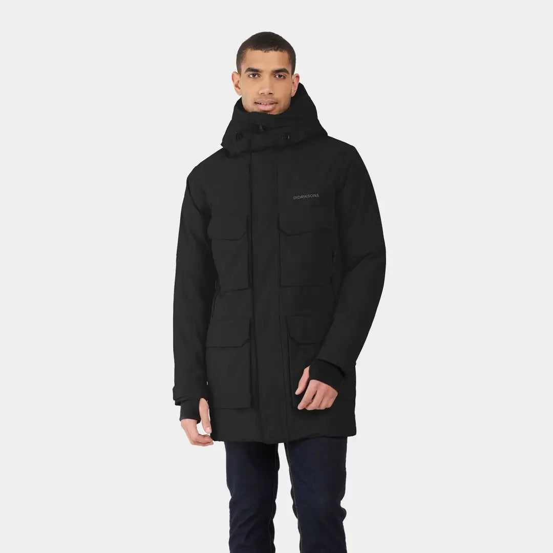 Black Didriksons Drew Parka 8 for chilly days, featuring a high collar and hood