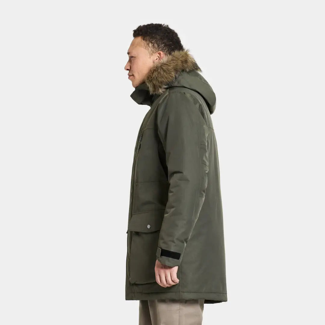 Green Didriksons Marco Parka 3 with fur hood, perfect for country clothing and outdoor adventures