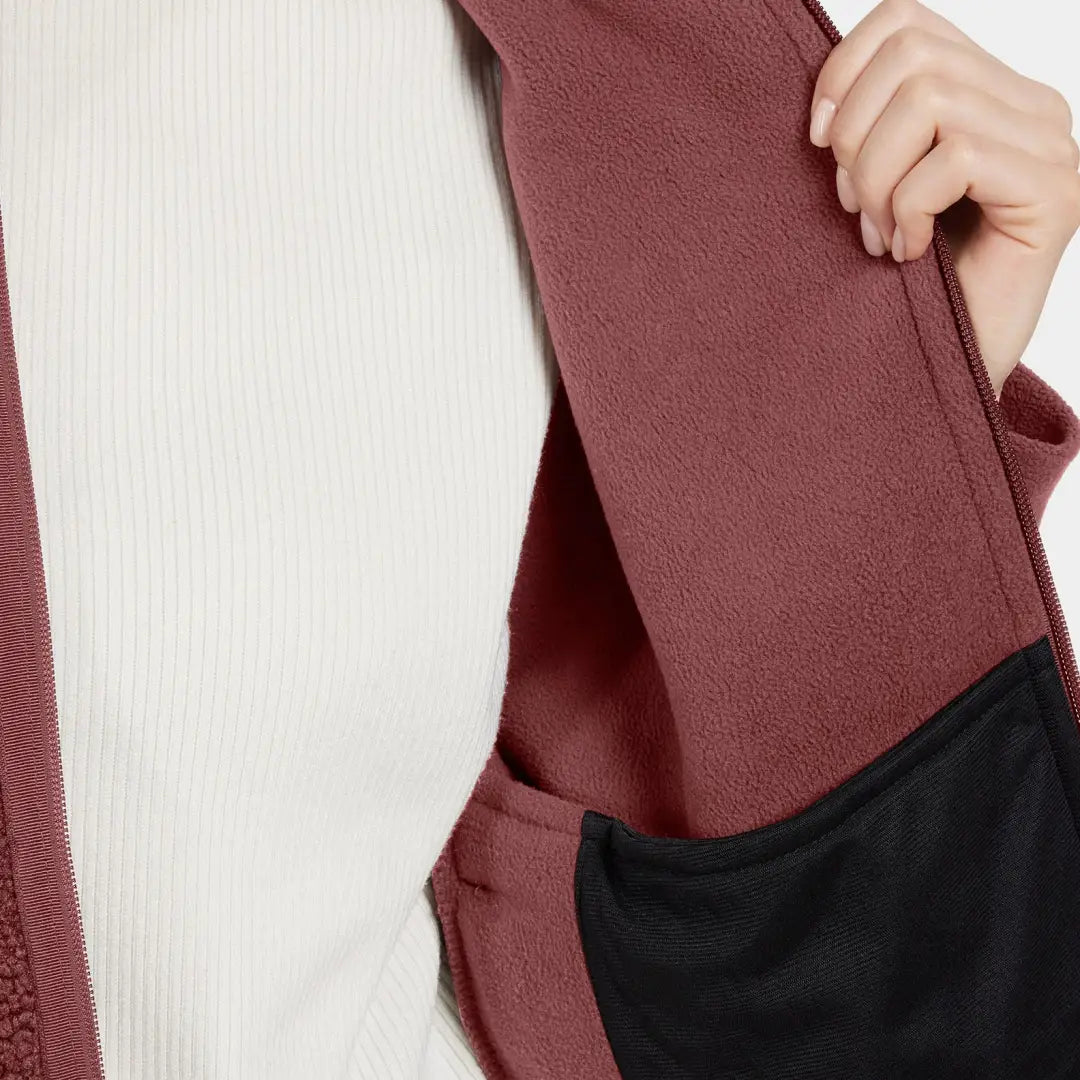 Burgundy Didriksons Mella 3 fleece showcasing its cozy lining for autumn’s crisp winds