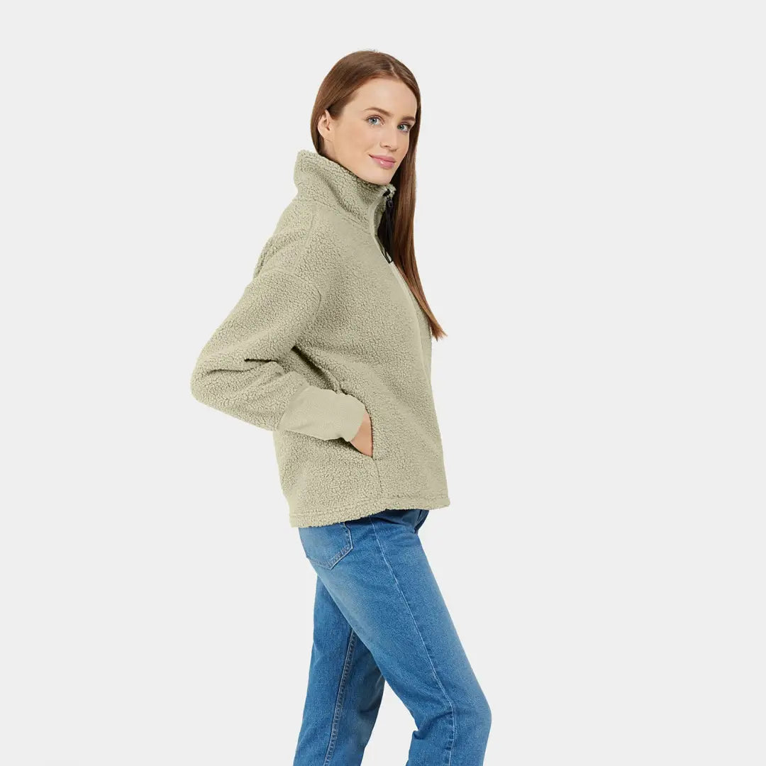 Cozy beige fleece jacket perfect for chilly autumn winds paired with blue jeans