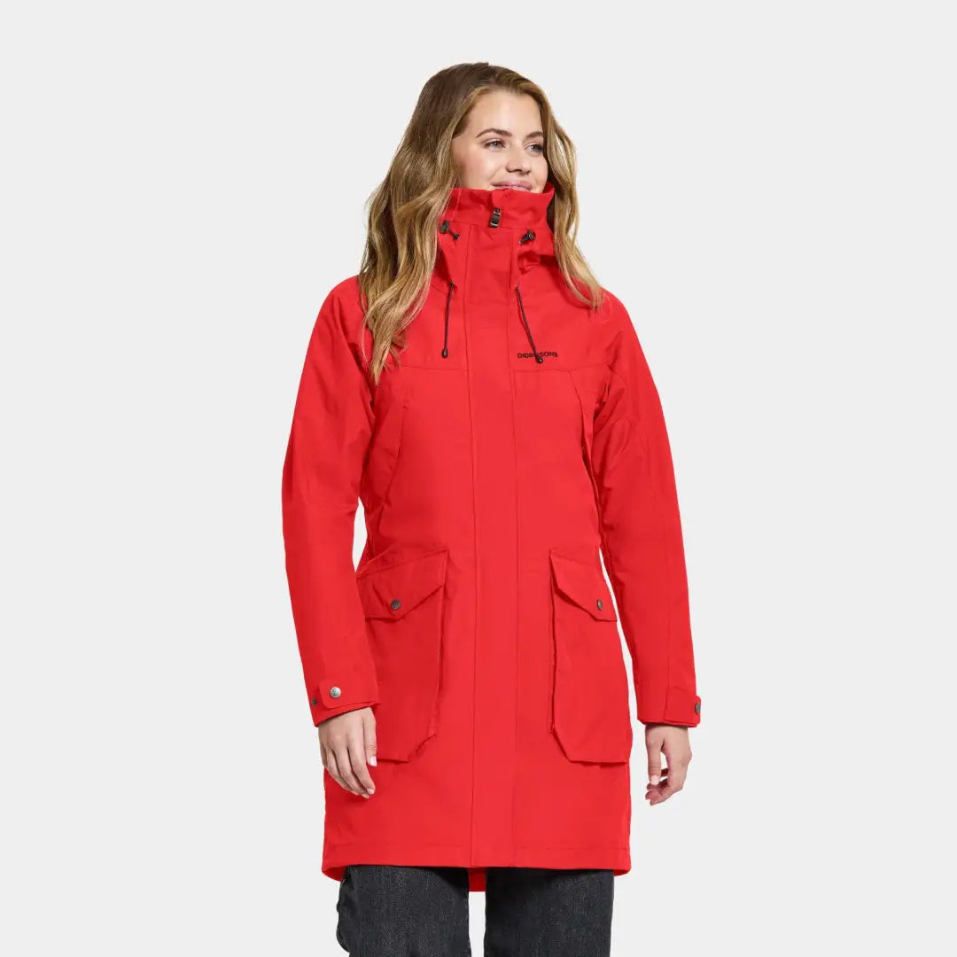 Bright red Thelma Womens Parka in iconic Didriksons style with large pockets