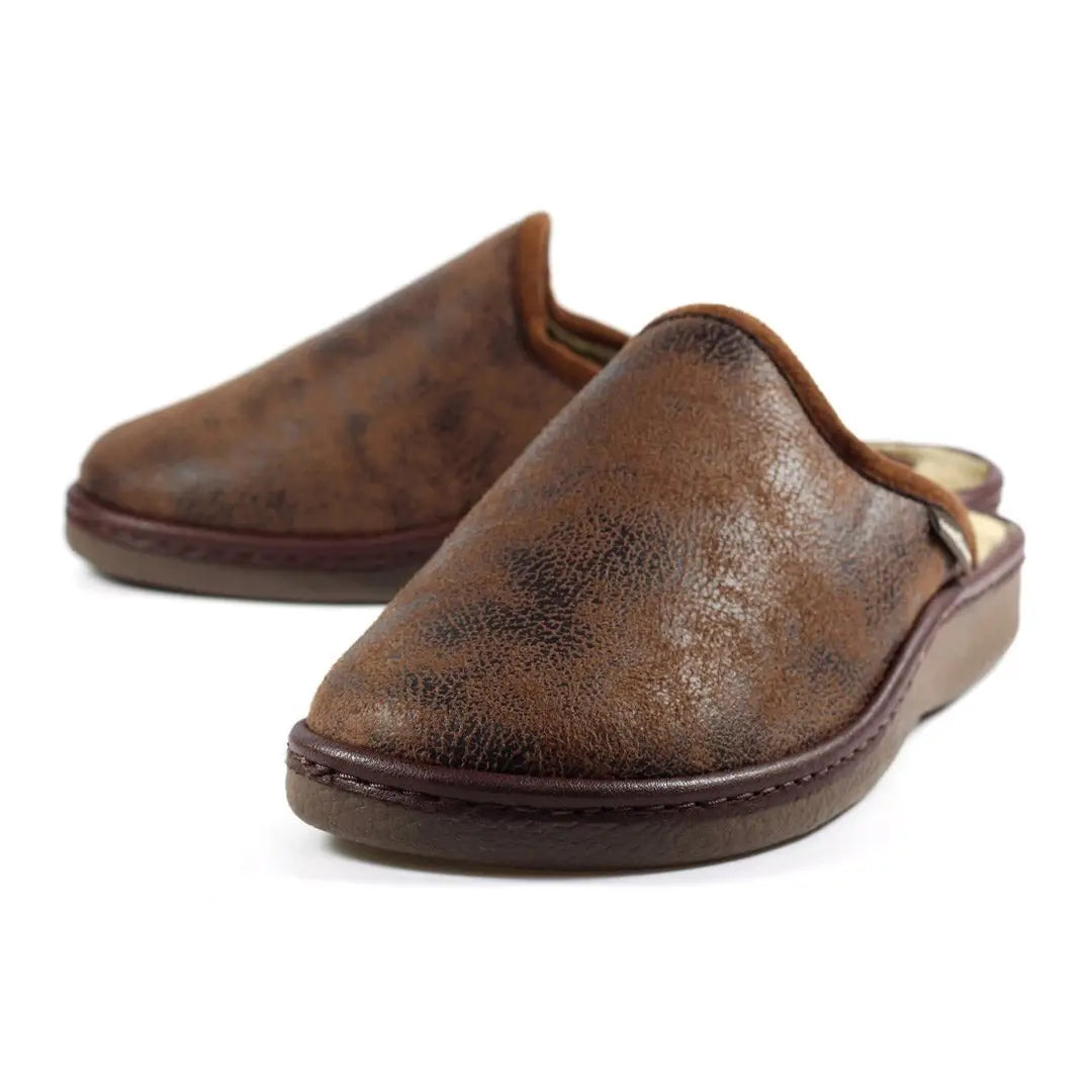 Pair of brown leather Goodyear Glen Mule Slippers for comfy at-home lounging