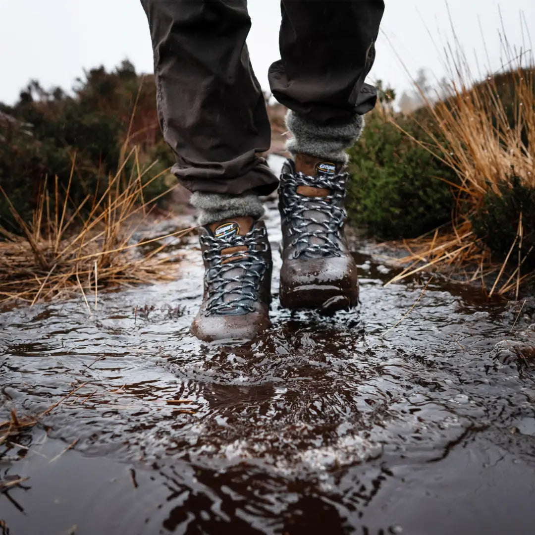 Grisport Fuse Lowland Trekking Boots in shallow water on a muddy trail, perfect walking boots