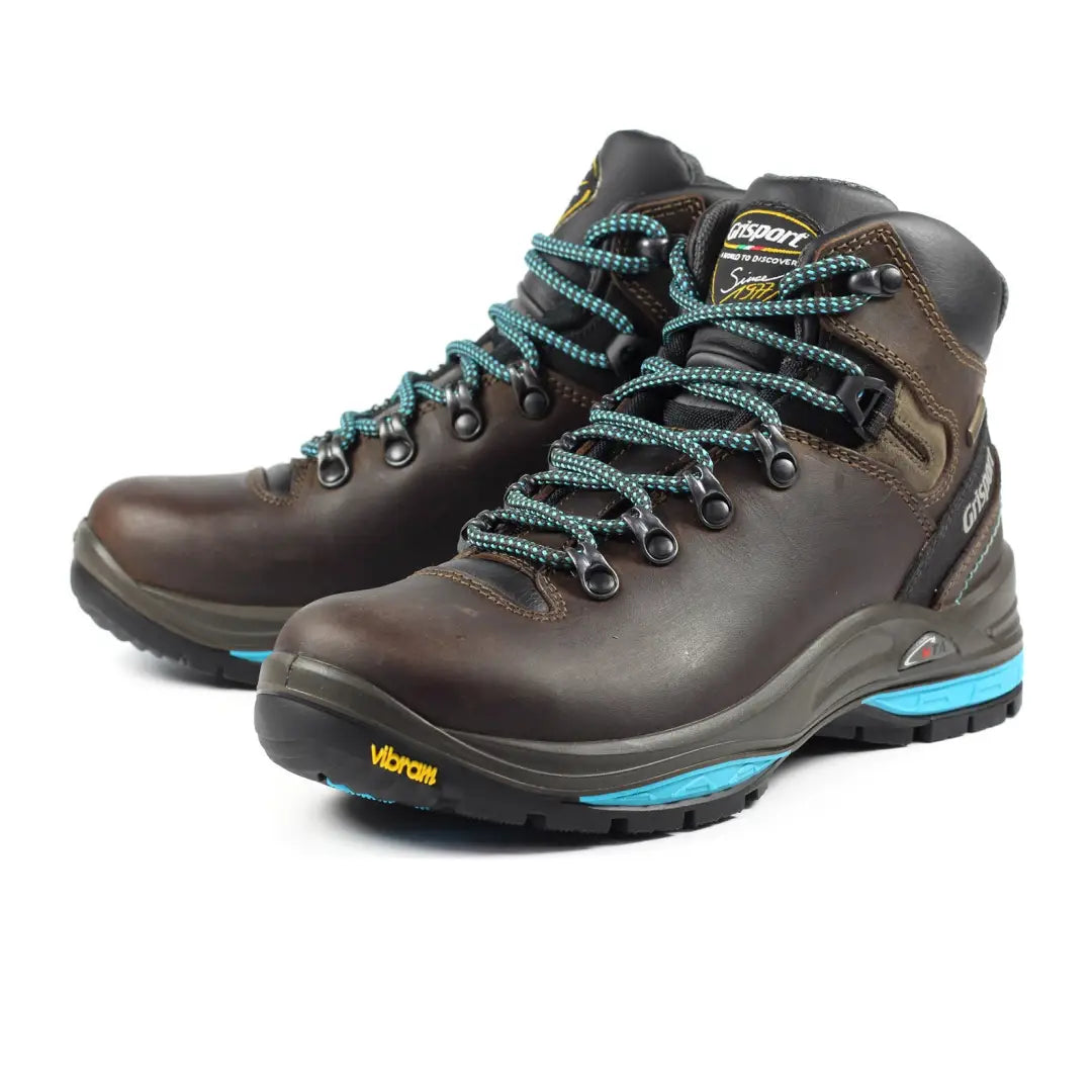 Pair of brown leather Grisport Lady Glide Hiking Boots with teal laces and blue soles