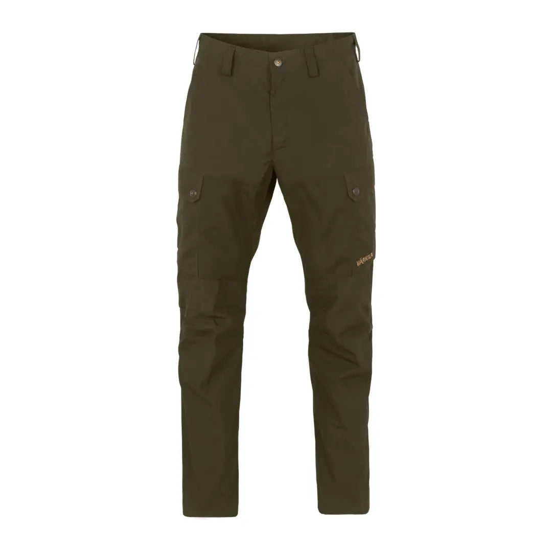 Dark green Harkila Asmund Trousers in waxed canvas, perfect for lightweight outdoor leisure