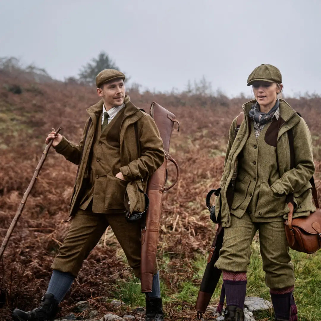 Two men in traditional hunting clothes with shotguns, showcasing Kenmore Shooting Waistcoat