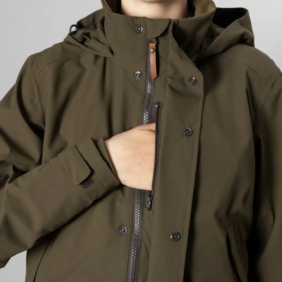 Olive green Harkila Orton Tech HWS Jacket with zippers and snap buttons for women