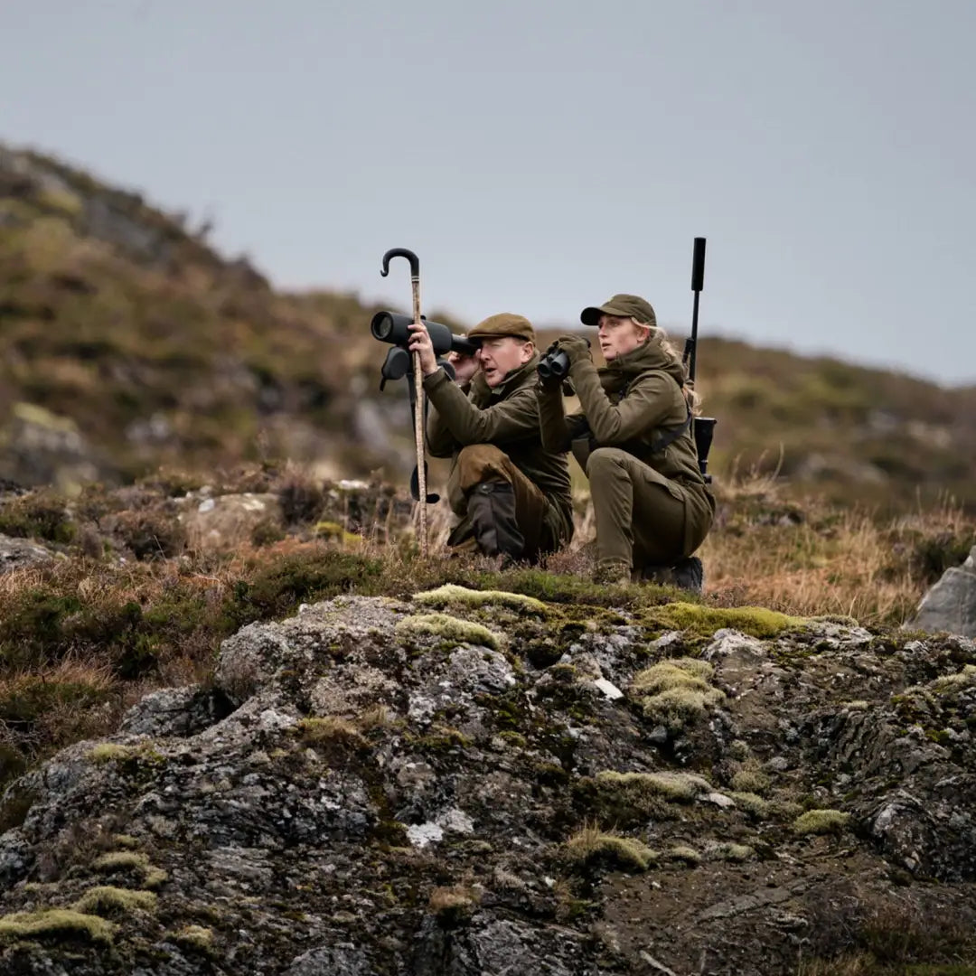 Two hunters on rocky terrain wearing Harkila Pro Hunter GTX Ladies Jacket