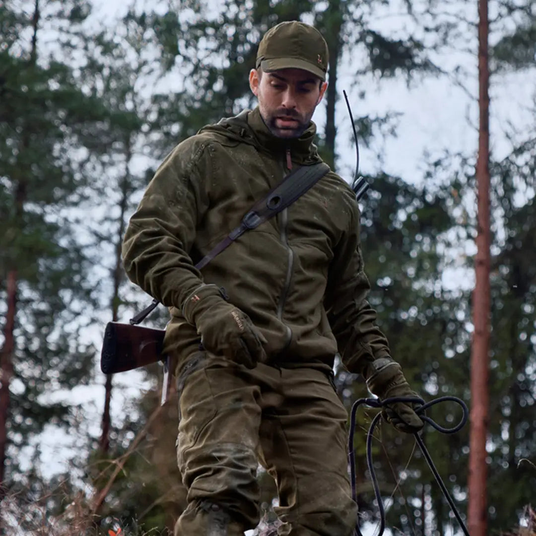 Soldier in camouflage wearing Harkila Pro Hunter Move 2.0 GTX Jacket with elasticated drawstring