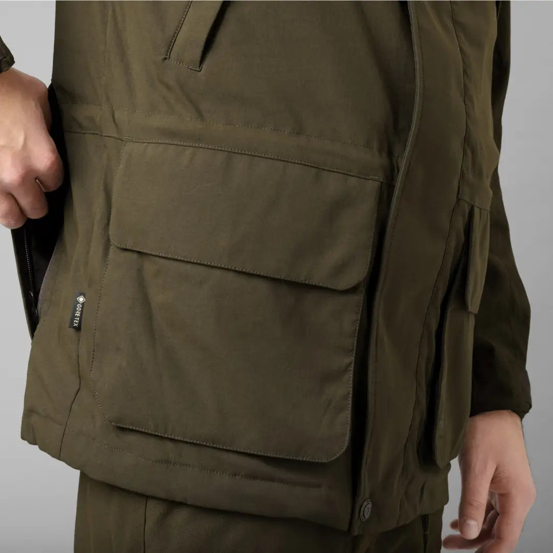 Olive green utility vest with pockets and zipper for the Harkila Pro Hunter shooting gear