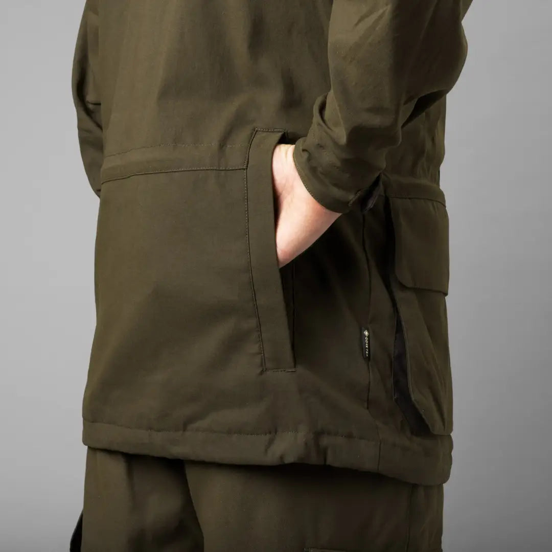 Olive green Harkila Pro Hunter Shooting GTX Jacket with hand in pocket style