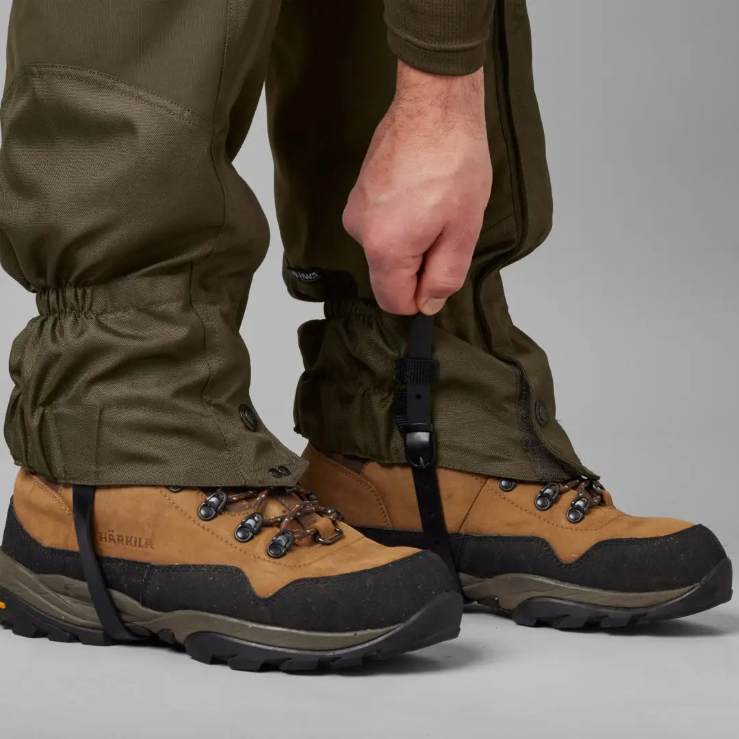 Rugged hiking boots paired with Harkila Pro HWS Gaiters for ultimate outdoor adventures