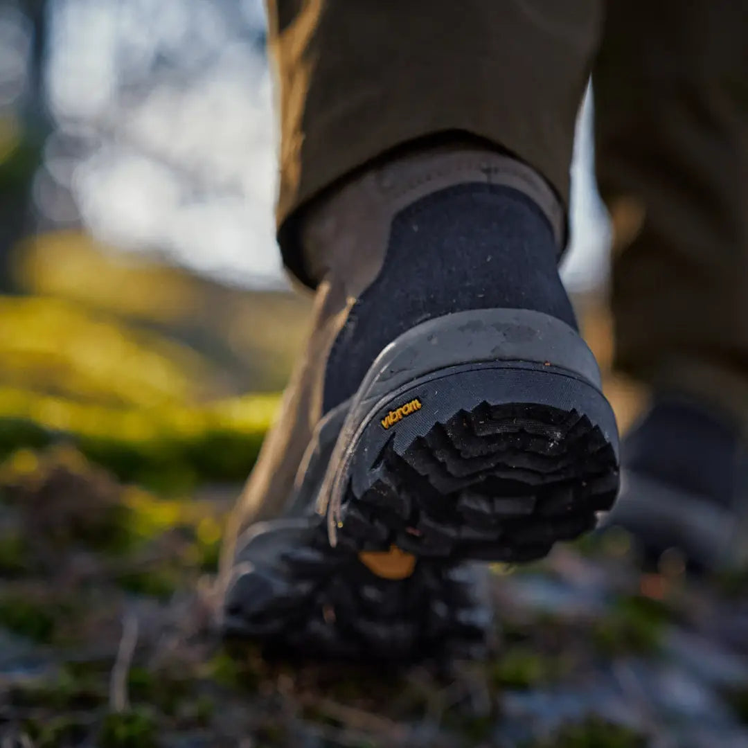 Harkila Reidmar Mid 2.0 GTX Boots with rugged sole on outdoor terrain for adventure