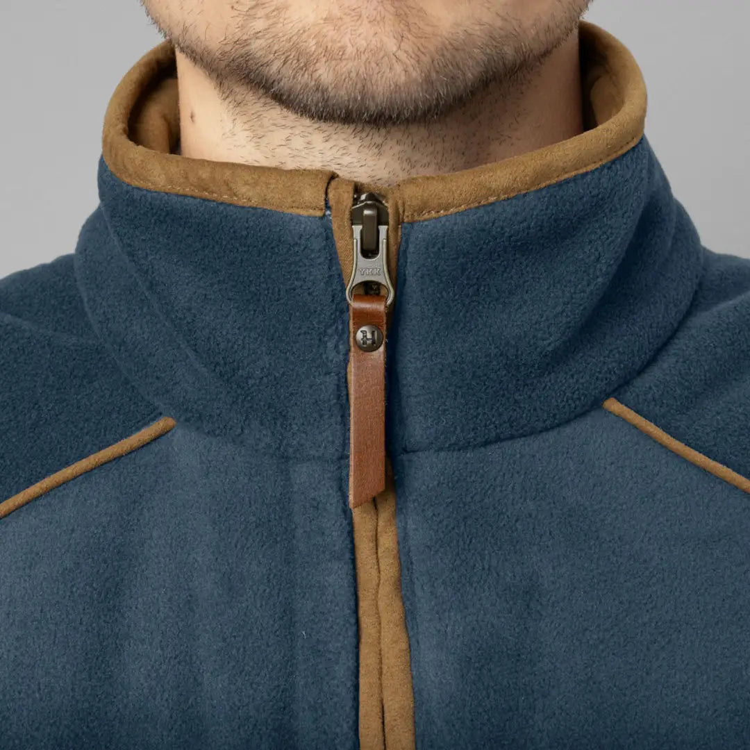 Blue fleece jacket with tan collar and zipper from Harkila Sandhem, perfect for country clothing