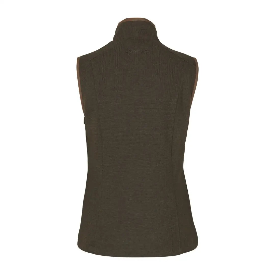 Dark green sleeveless turtleneck top paired with Harkila Sandhem Pro women’s waistcoat