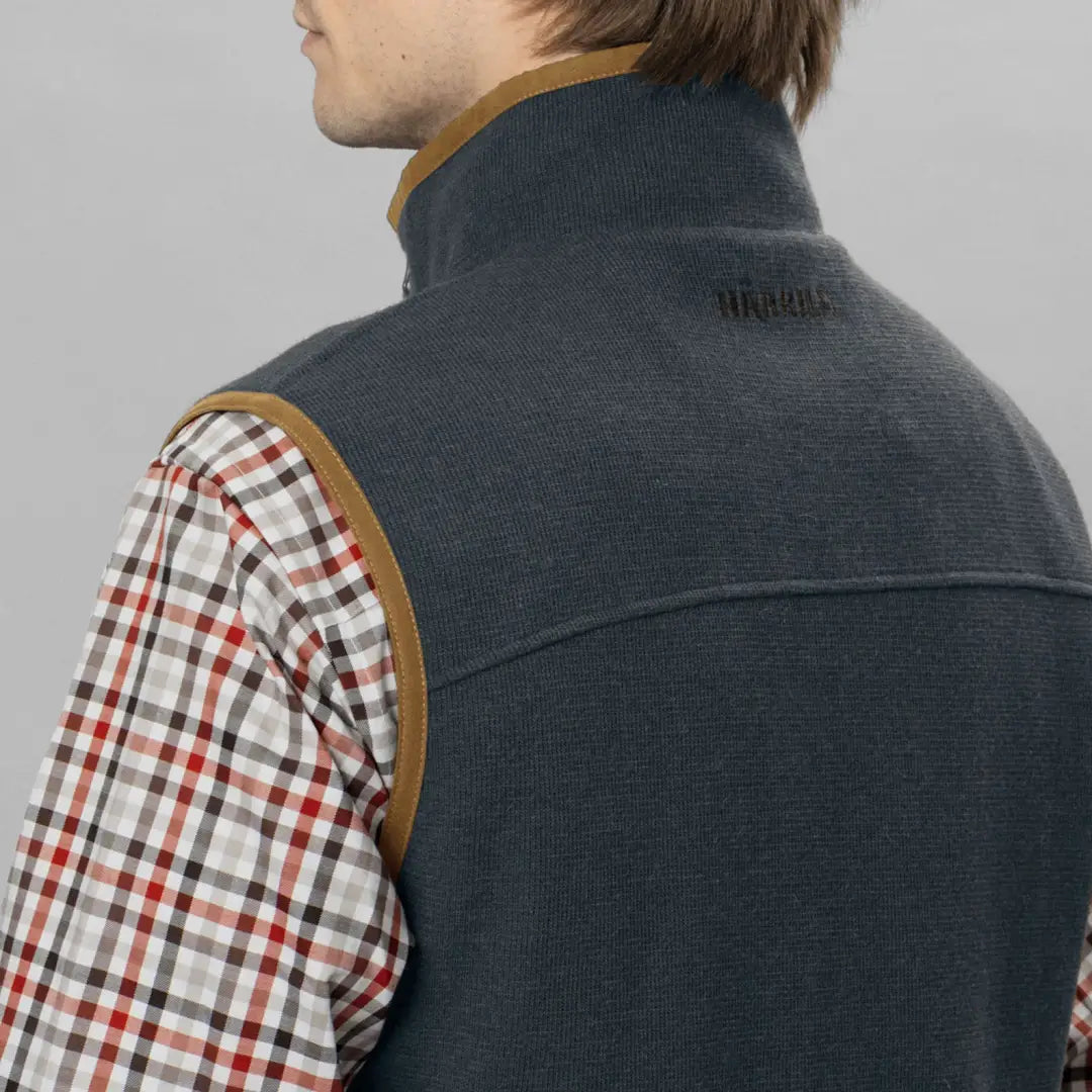 Navy blue fleece vest over a plaid shirt, perfect for the Harkila Sandhem Pro Waistcoat