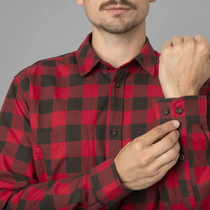 Red and black checkered flannel shirt, a durable choice designed for Härkila Scandinavian style