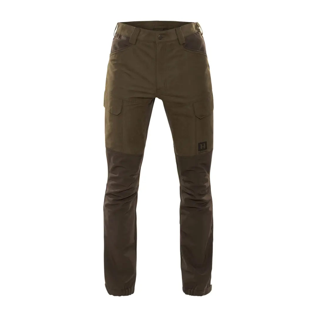 Olive green Härkila Scandinavian trousers featuring cargo style and reinforced knees